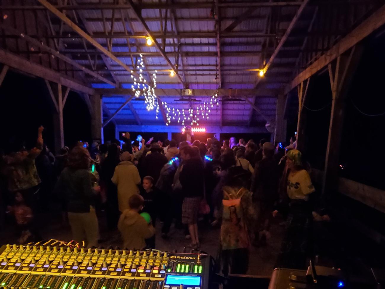 Distant Stars is rocking while E&amp;nbsp;Stew Productions is on live sound and lighting at the Farm Fest dance pavilion in 2021.